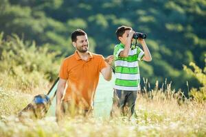 Father and son camping photo