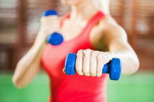 A woman doing physical exercises photo