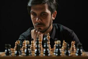 A man playing chess photo