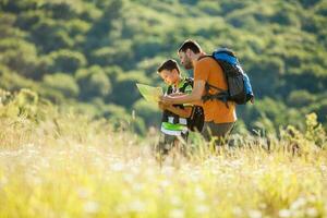 Father and son spending time outdoors photo