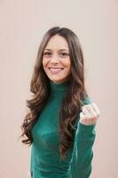 A woman with a green blouse photo