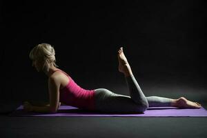 A woman doing physical exercises photo