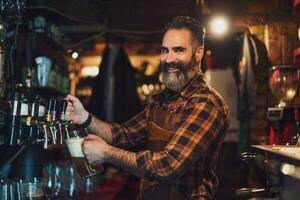 Portrait of a man who works as a bartender photo