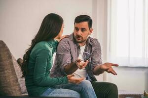 A couple arguing at home photo