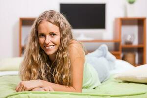 A woman in her bedroom photo