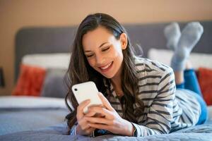 A woman using her phone photo