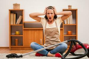 A woman cleaning the house photo