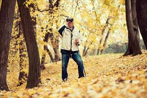 A senior man hiking photo