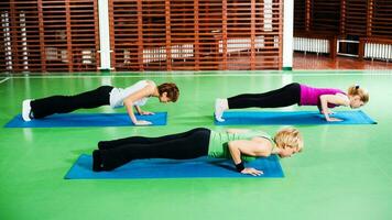 Women doing physical exercises photo