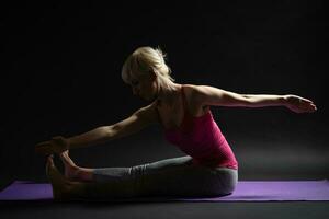 A woman doing physical exercises photo