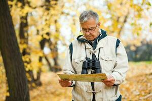 A senior man hiking photo