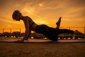 A woman doing physical exercises photo