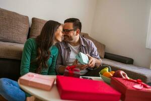 Young couple is cleaning their apartment photo