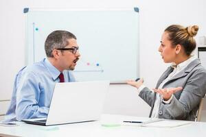 Business people discussing a business strategy photo