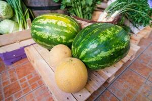 Healthy fruit and vegetables in grocery shop photo