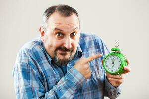 A man with a clock photo