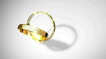 Wedding rings animtion forming heart shaped shades. video