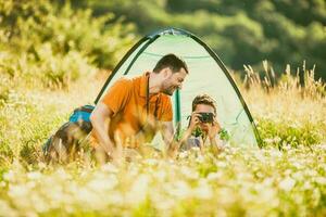 Father and son camping photo