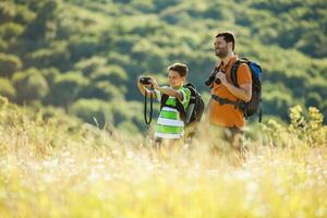 Father and son spending time outdoors photo