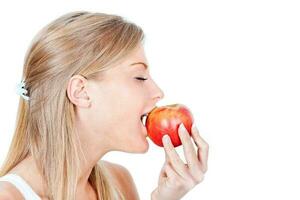 mujer promoviendo sano comiendo hábitos foto