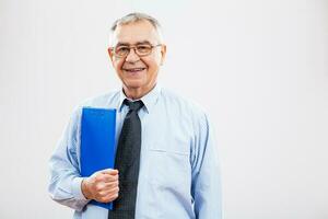 Portrait of a happy senior businessman photo