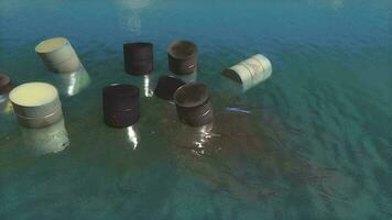 Toxic waste barrels floating on water video