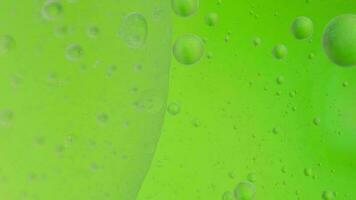 Oil bubble moving on water concept minimal background,  oilpaint spaces with bubbles video