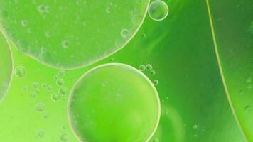 Oil bubble moving on water concept minimal background,  oilpaint spaces with bubbles video