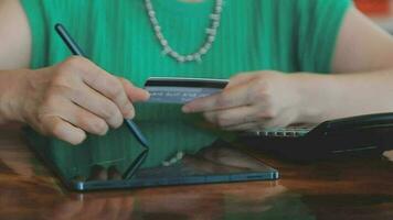 Online payment,Man's hands holding a credit card and using smart phone for online shopping video