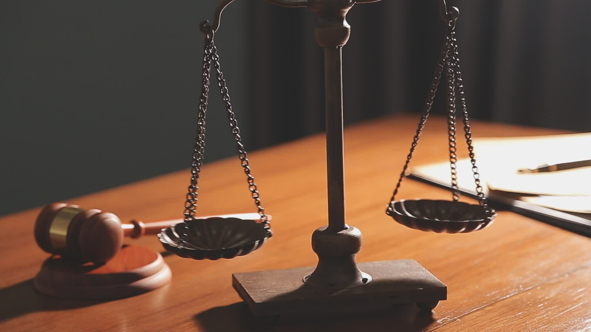 Justice and law concept.Male judge in a courtroom with the gavel