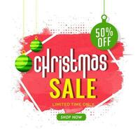 Christmas Sale poster or template design with 50 discount offer and hanging baubles on brush stroke halftone effect background. vector