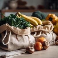 Vegetables in eco organic cotton bags. Zero waste food shopping. photo