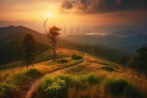 Wind generators turbines at sunset photo