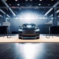 View of a generic and brand less modern car on the presentation stage background photo