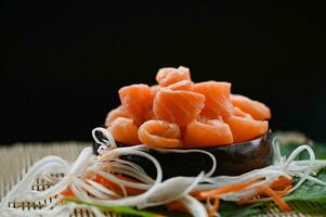 salmon sashimi food salmon fillet japanese menu with shiso perilla leaf lemon herb and spices, fresh raw salmon fish for cooking food seafood salmon fish photo