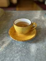 Tea cup on table photo