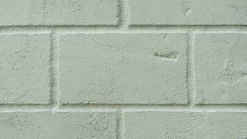Horizontal view of bricks are painted white. For background and textured. photo