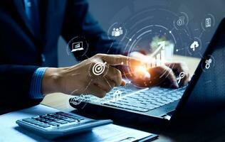 Business analysis and strategy concept. business people use computers to analyze business growth. quality control. Set goals, solutions, workflows, business optimization and innovation. photo