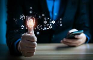 Businessman using fingerprint to access personal financial information, biosecurity. Cybersecurity and hacker protection technology, identity verification, digital financial information photo
