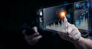 Businessman analyzing business enterprise data management, Business analytics with charts, metrics and KPIs to performance organization. Corporate strategy for finance, operations, sales, marketing photo
