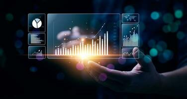 Businessman analyzing business enterprise data management, Business analytics with charts, metrics and KPIs to performance organization. Corporate strategy for finance, operations, sales, marketing photo
