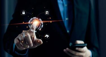 Businessman using fingerprint to access personal financial information, biosecurity. Cybersecurity and hacker protection technology, identity verification photo