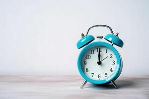 blue alarm clock on a white background. photo