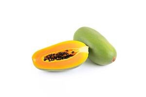 Fresh whole and sliced papaya fruits isolated on white background. photo