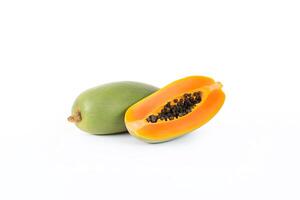 Fresh whole and sliced papaya fruits isolated on white background. photo