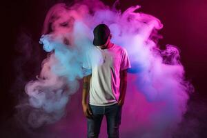 a man standing in front of a cloud of smoke with neon lights. photo