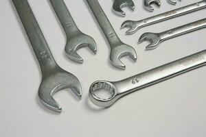 Set of tools for repair in a case on a white background. Assorted work or construction tools. Wrenches, Pliers, screwdriver. Top view photo