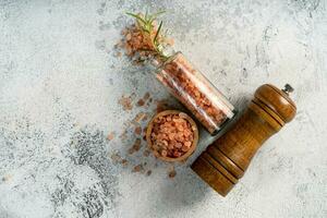 Himalayan pink salt is herb seasoning isolated on white abstract background with copy space photo