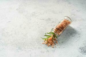 Himalayan pink salt is herb seasoning isolated on white abstract background with copy space photo