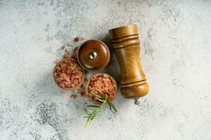Himalayan pink salt is herb seasoning isolated on white abstract background with copy space photo